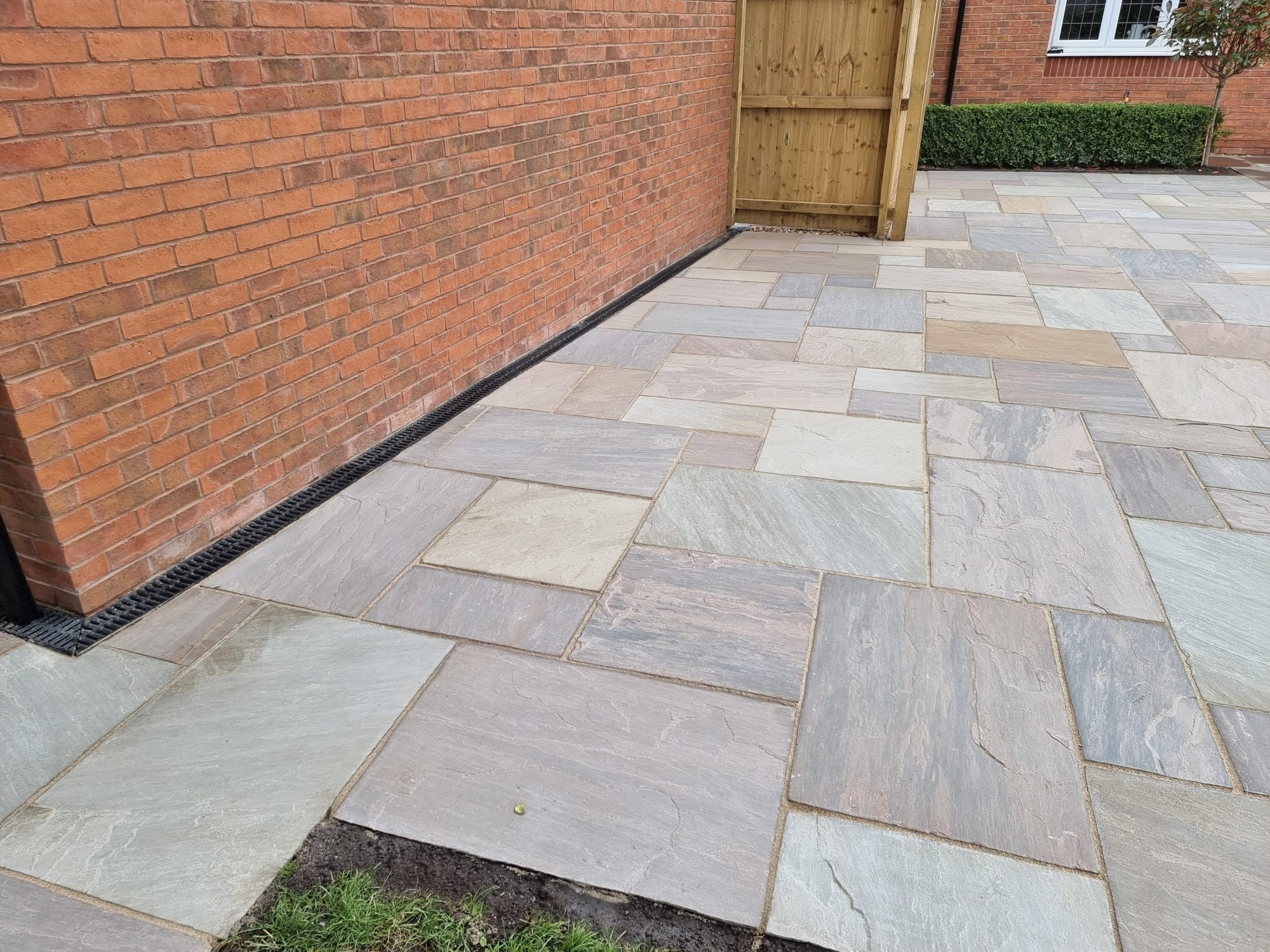 Indian sandstone patio design by PTS Groundworks